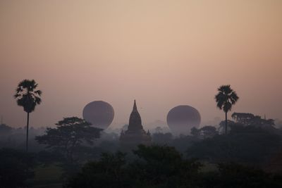 Historic temple against sky during sunset