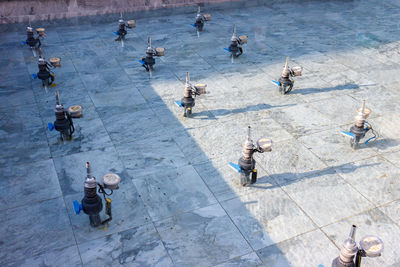 High angle view of people walking in town square