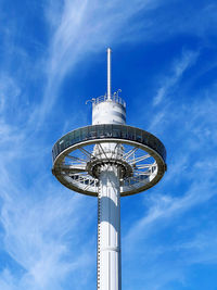 Low angle view of windmill against sky