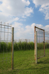 View of soccer field against cloudy sky