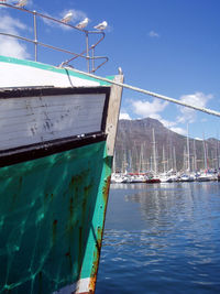 Sailboat in sea against sky