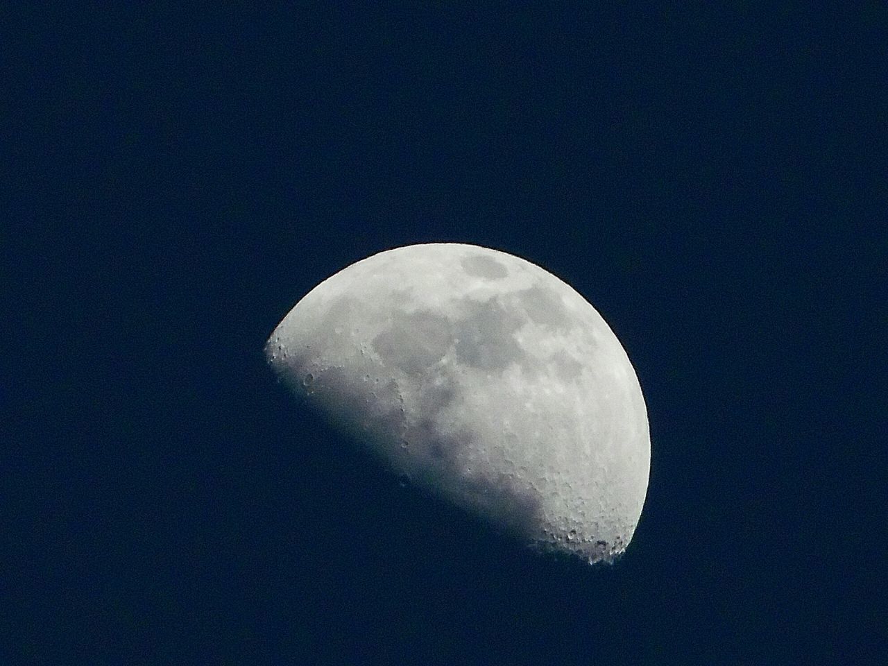 moon, astronomy, night, space, sky, planetary moon, beauty in nature, low angle view, moon surface, scenics - nature, tranquility, no people, copy space, half moon, nature, tranquil scene, space exploration, clear sky, outdoors, discovery, astrology, space and astronomy, moonlight