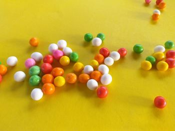 High angle view of multi colored balls on table