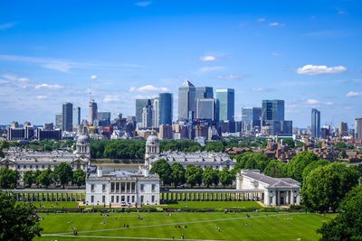 Buildings in city against sky