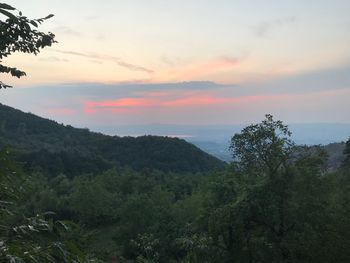 Scenic view of mountains against sky during sunset