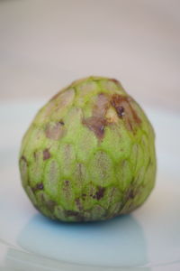 Close-up of fruit on table