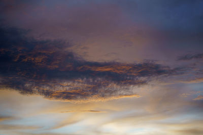 Low angle view of dramatic sky during sunset