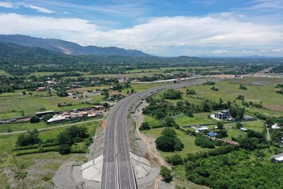 High angle view of road amidst landscape against sky