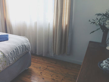 View of bed from window at home