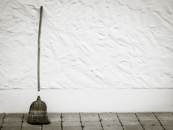 Broom against the wall