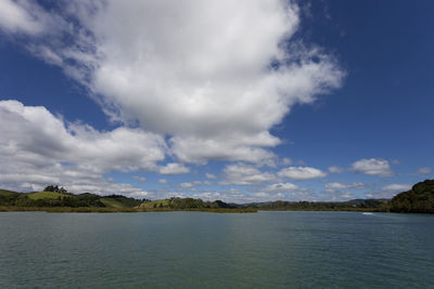 View of lake against cloudy sky