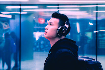 Portrait of young man looking away