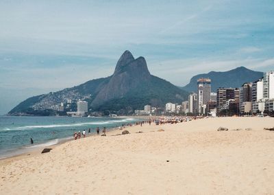 Panoramic view of people on beach