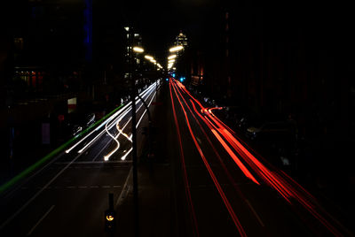 High angle view of light trails on road at night