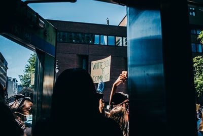 People standing in front of building