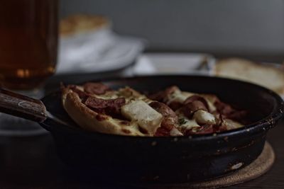 Close-up of food in pan on table