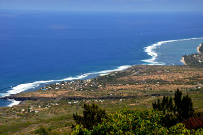 Scenic view of sea against blue sky