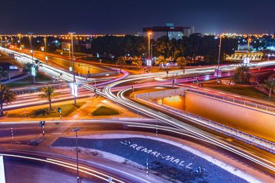 Light trails on city street at night