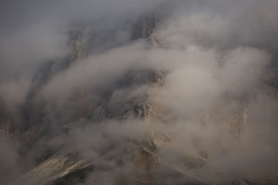 Scenic view of mountains during foggy weather