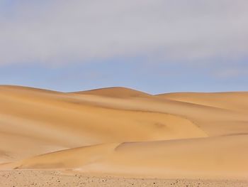 Scenic view of desert against sky