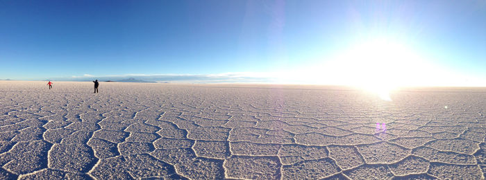 Panoramic view of salar de uyuni against sky