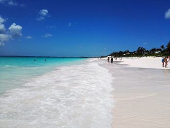 View of beach against blue sky