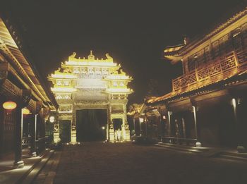 View of illuminated temple at night