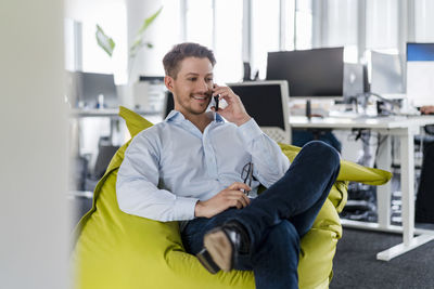 Young man using mobile phone