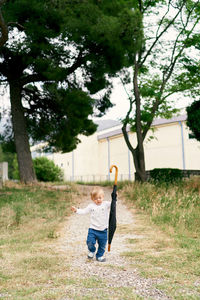 Full length of boy in park