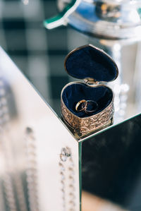 High angle view of coin on table