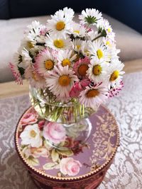 Close-up of flower vase on table