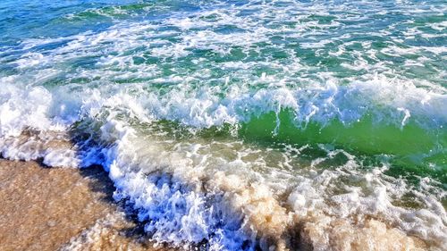 High angle view of waves in sea