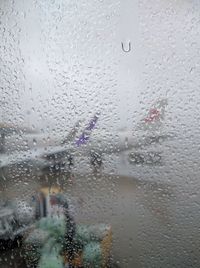 Close-up of water drops on glass window