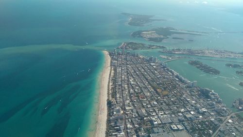 Aerial view of cityscape and sea