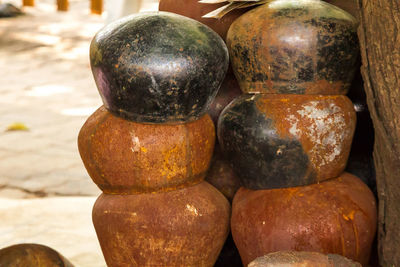 Close-up of old food on table at market stall