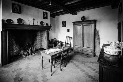 Empty chairs and table at home