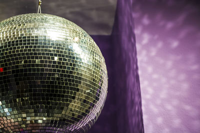 Close-up of disco ball at night