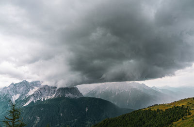 Rain wall and downpour in the sexten dolomites, italy.