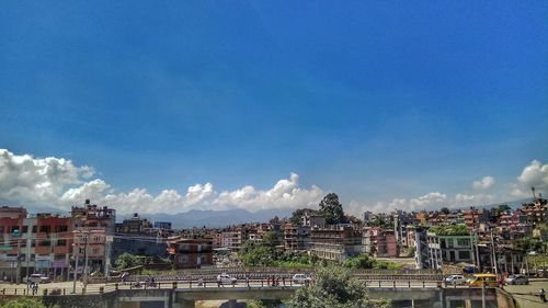 Cityscape against blue sky