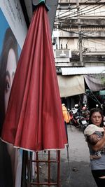 People standing at market in city