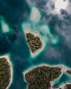 Aerial view of turtle like formation of islands in lake