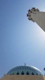 Low angle view of cross against clear blue sky