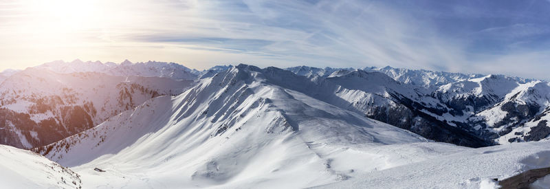 Scenic view of snowcapped mountains against sky