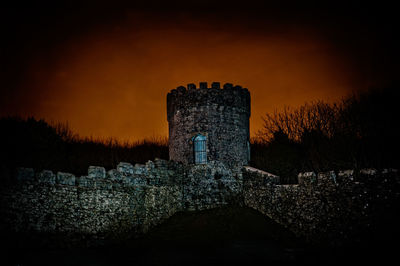 Old ruin building against sky during sunset