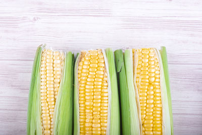 High angle view of vegetables on table against white background