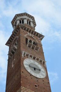 Low angle view of clock tower against sky