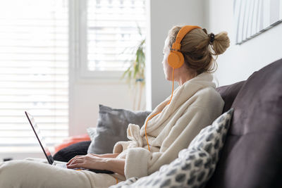 Businesswoman working from home at home