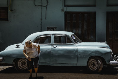 Vintage car on road in city