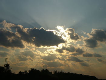 Scenic view of landscape against cloudy sky