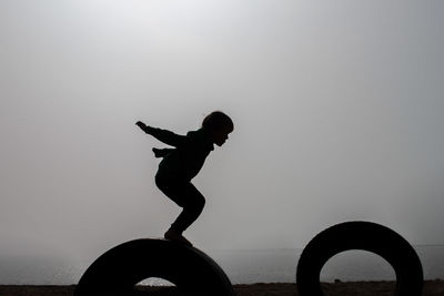 Full length of woman against sky